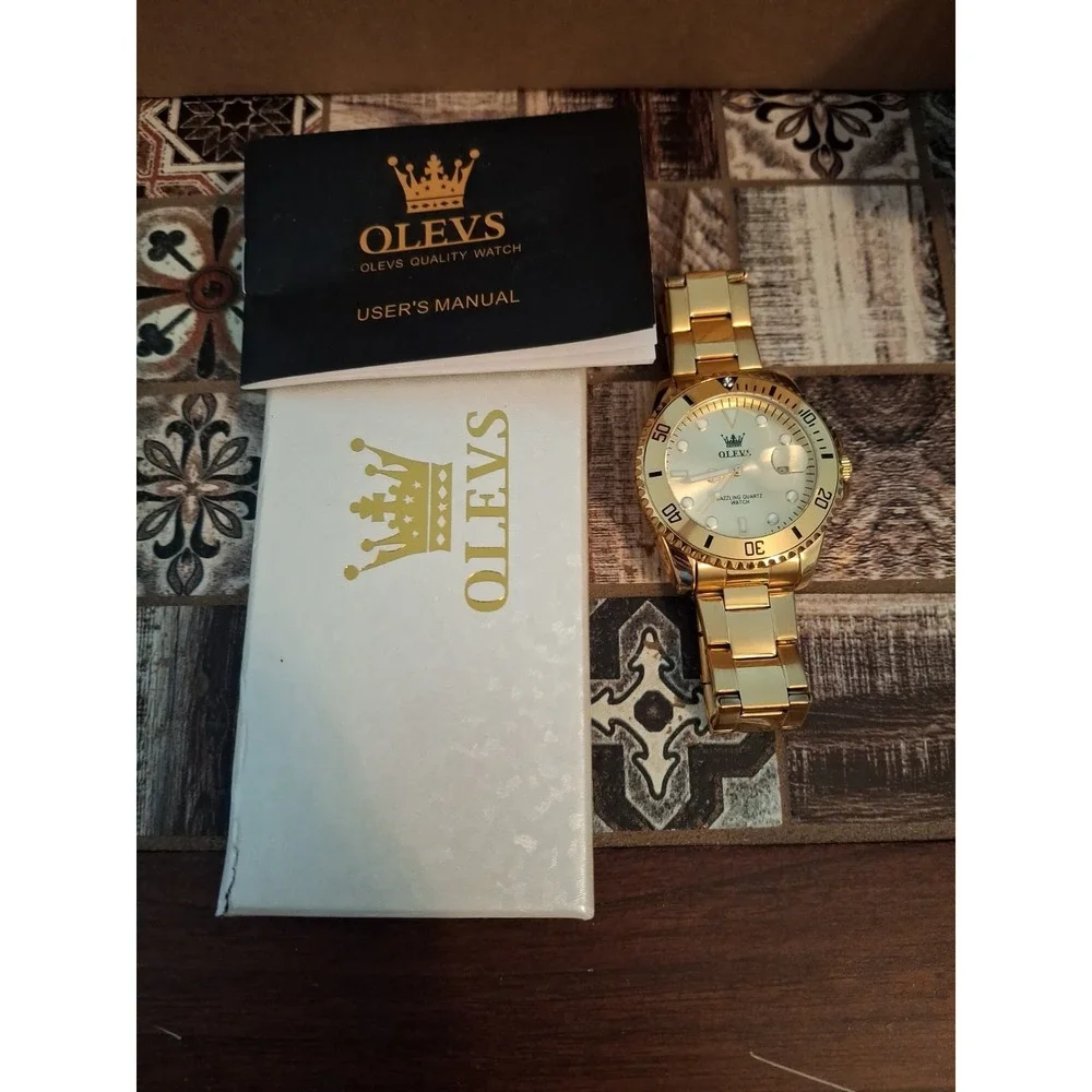 OLEVS 5885G 43mm Polished Goldtone Mens Watch,Day Indicator,Quartz Movement.